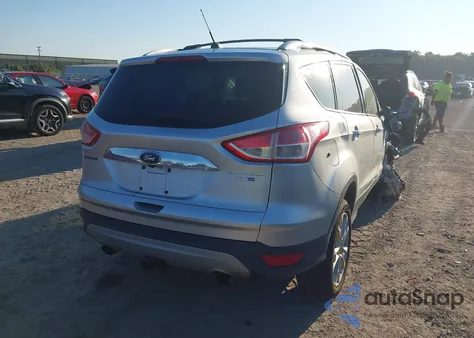 2014 Ford Escape Titanium z USA, uszkodzony, nr VIN 1FMCU9J93EUC80950